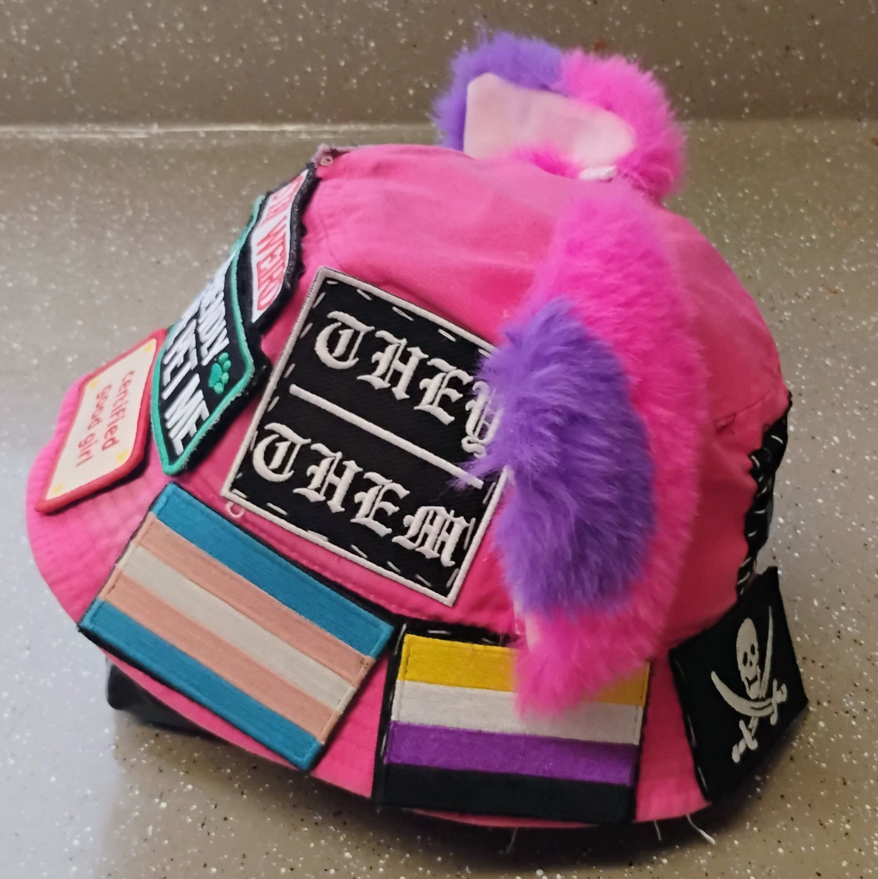 side of vanta's own pink cat ear hat
