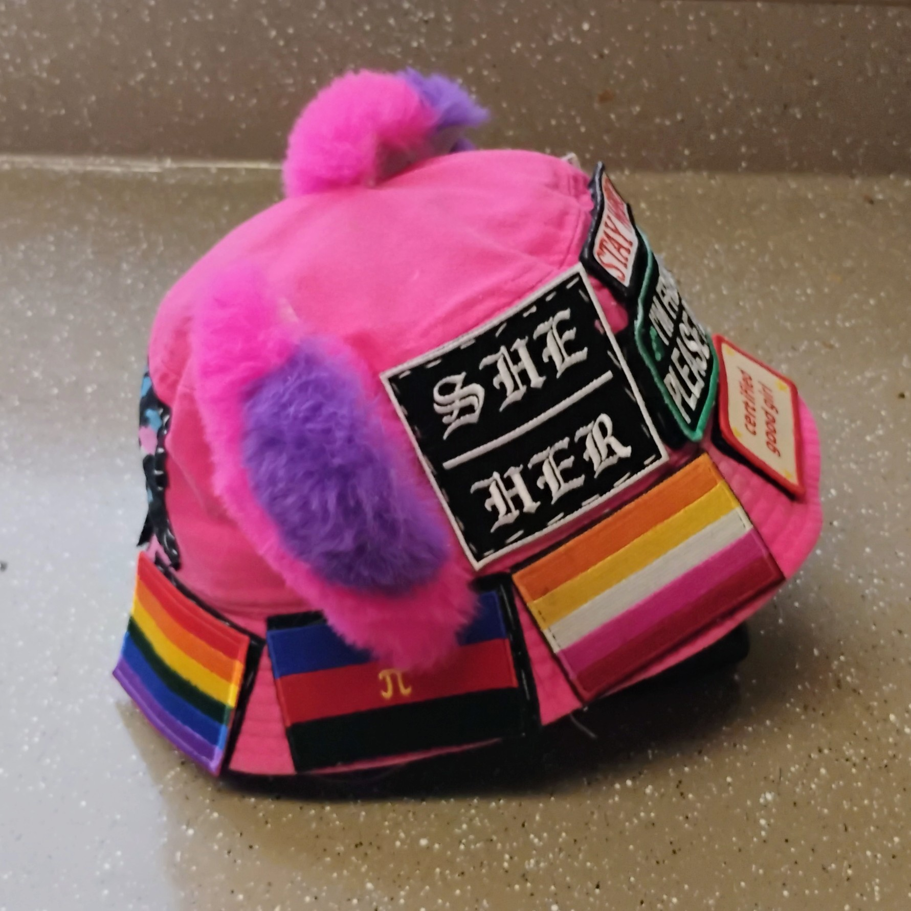 other side of vanta's own pink cat ear hat