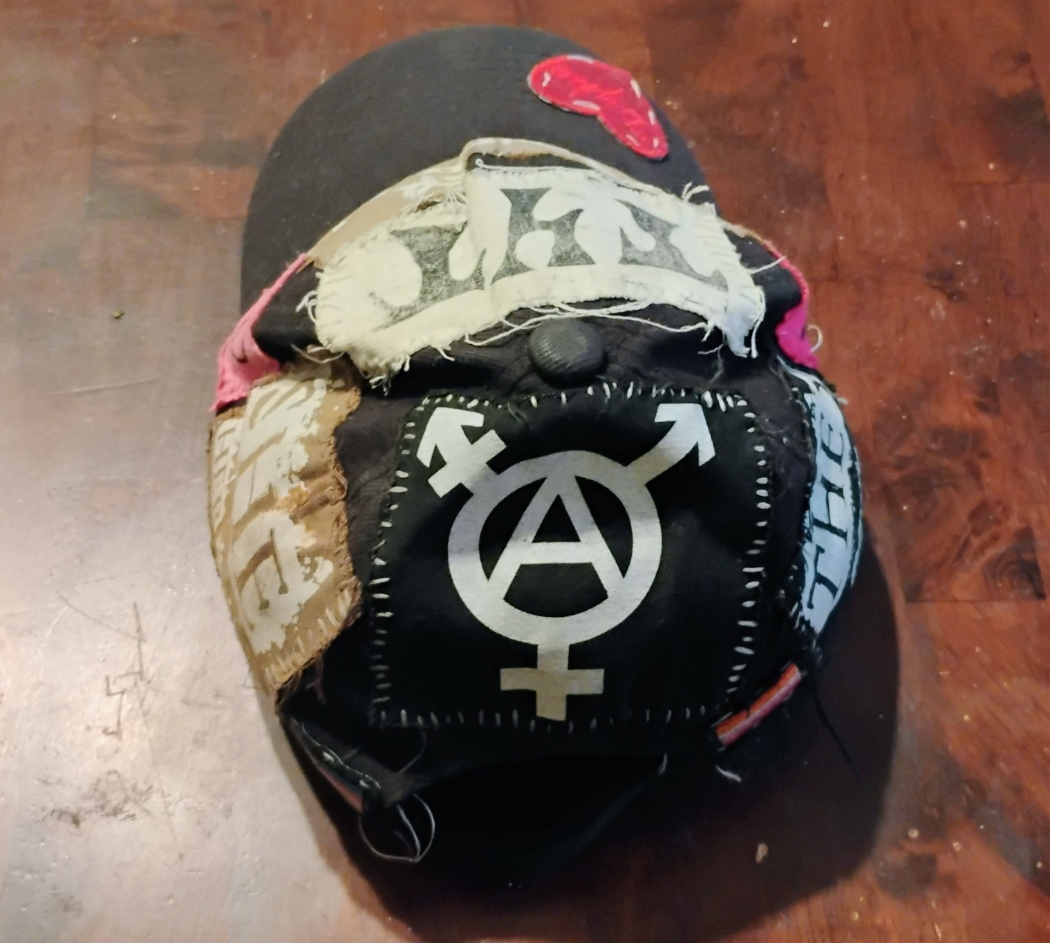 back of vanta's own gender terrorist hat